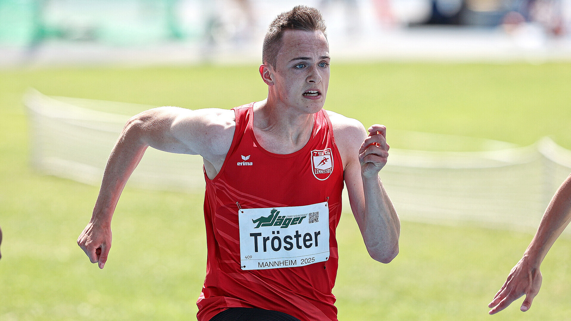 Nahaufnahme von Sprinter Ben Tröster in Aktion während der 100 Meter